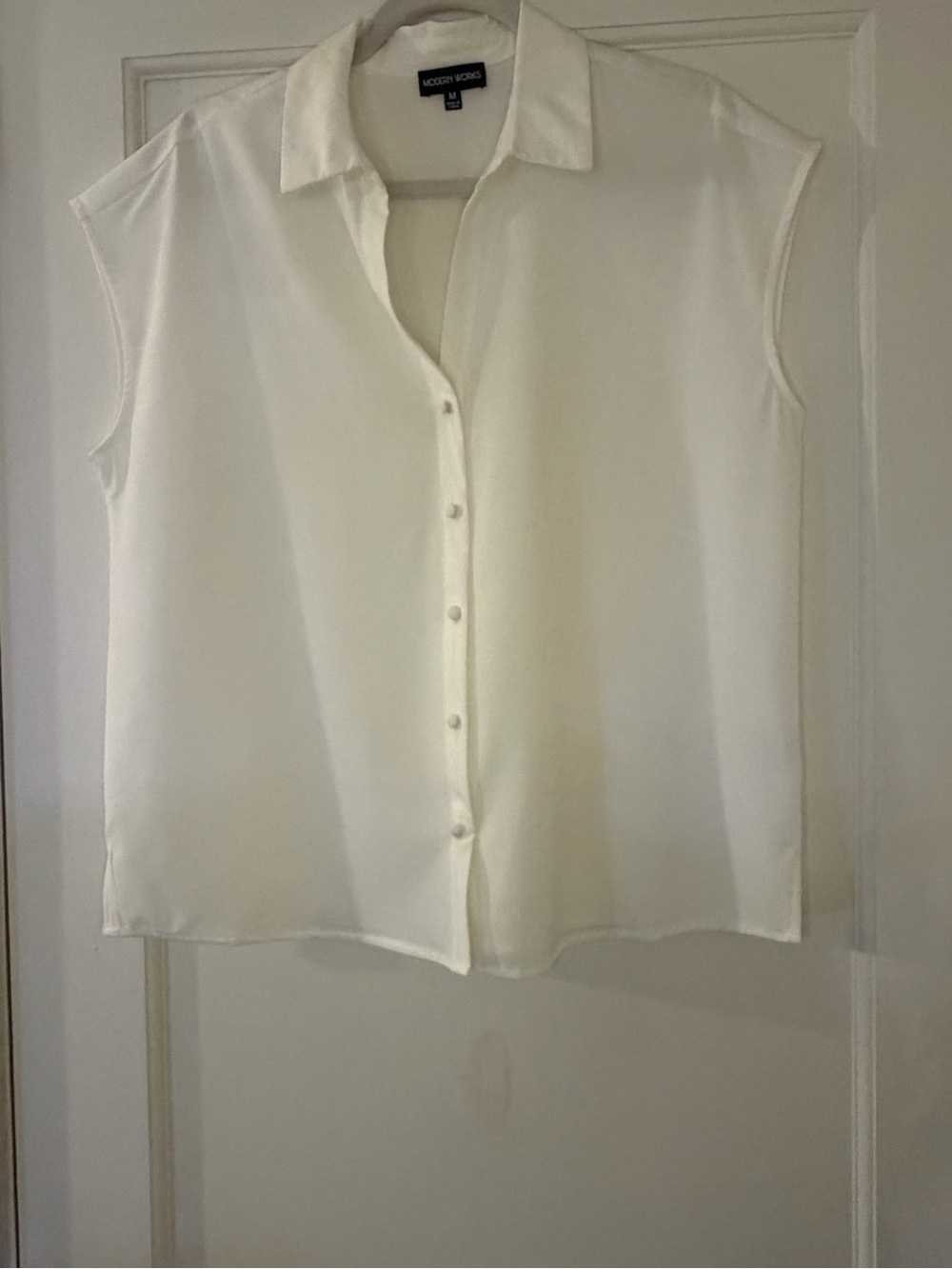 Sleeveless Button-Front Ivory Blouse